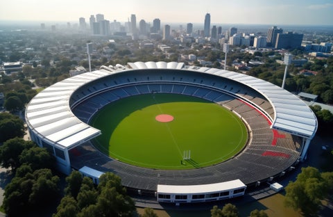 Aerial view of an arena in Adelaide, Australia, surrounded by cityscape