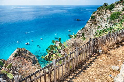 Aerial view of Tropea, Italy, showcasing the seaside cliffs, turquoise waters