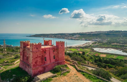View of Wignacourt Tower, the historic coastal watchtower and castle in St. Paul’s Bay, Malta