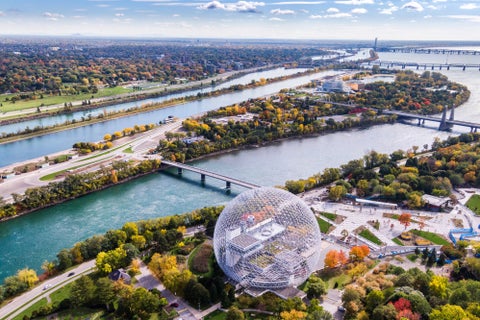 Mount Royal surrounded by lush greenery, while the St. Lawrence River in Montreal, Canada
