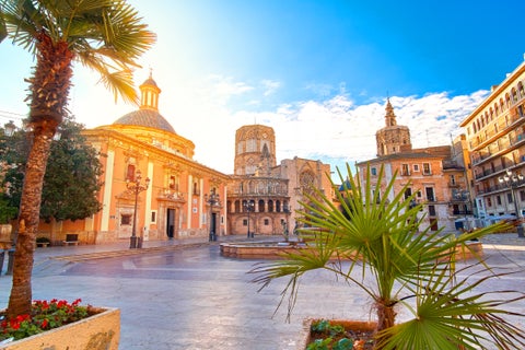Plaza de la Virgen in Valencia, Spain, featuring the Basilica of the Virgin of the Forsaken, Valencia Cathedral, and the Palau de la Generalitat Valenciana