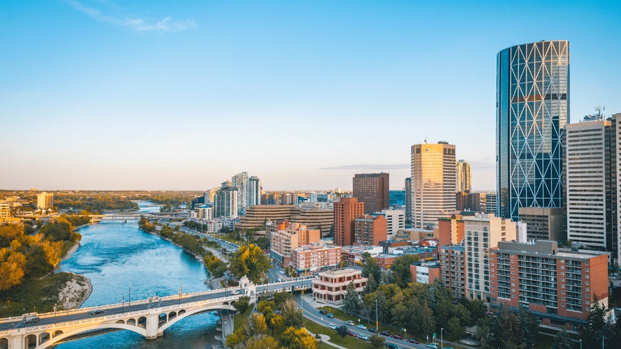 Aerial view of Calgary City Center with its Peace Bridge in Alberta, Canada