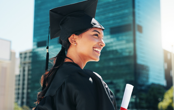 City, graduation and thinking with woman student outdoor for celebration or education event. Certificate, future and scholarship with smile of college or university graduate downtown for milestone