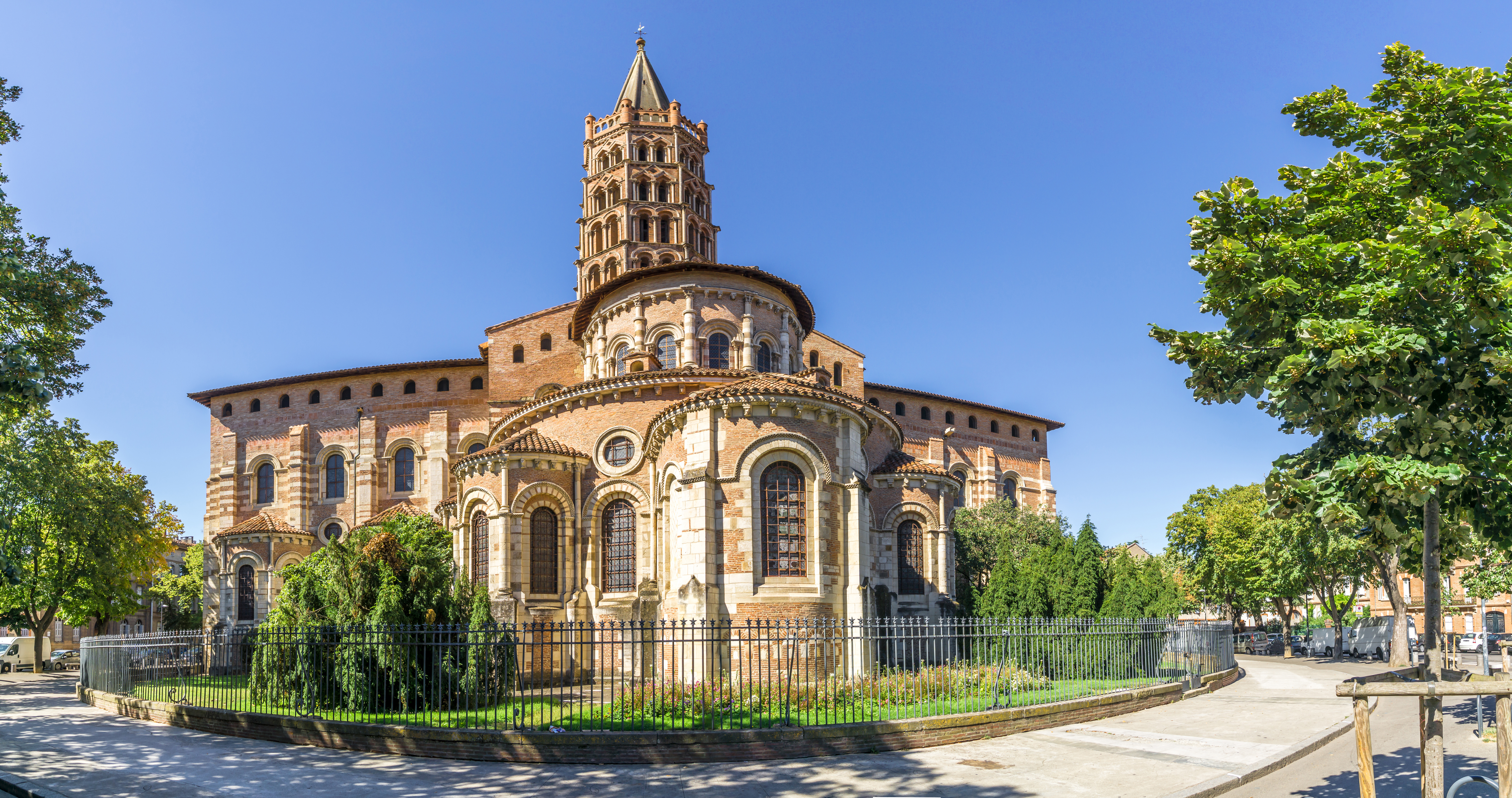 Basilica of Saint-Sernin in Toulouse, France, with its impressive Romanesque architecture with intricate stone details and towering spires