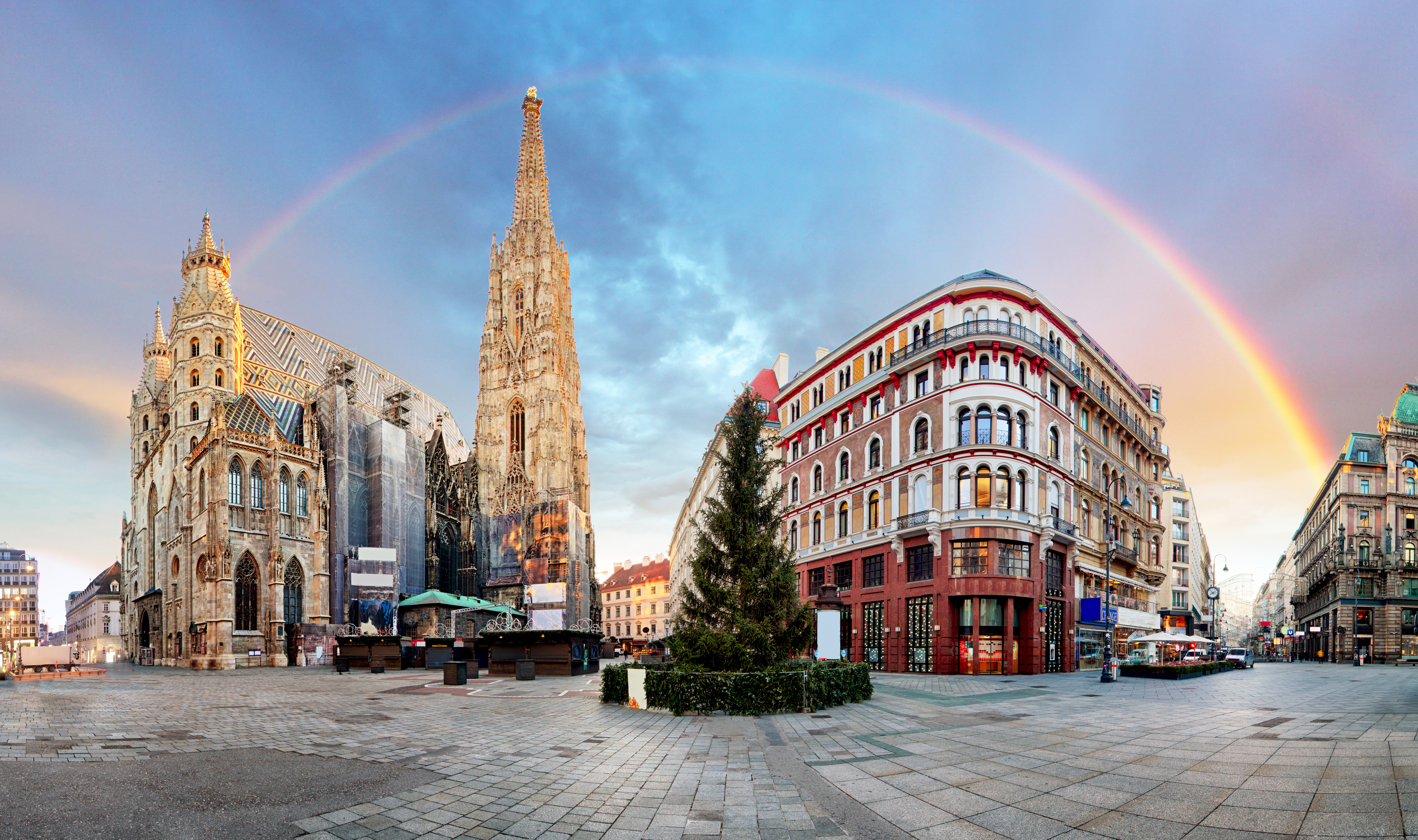 Panorama of Vienna square with rainbow - Stephens cathedral, Austria