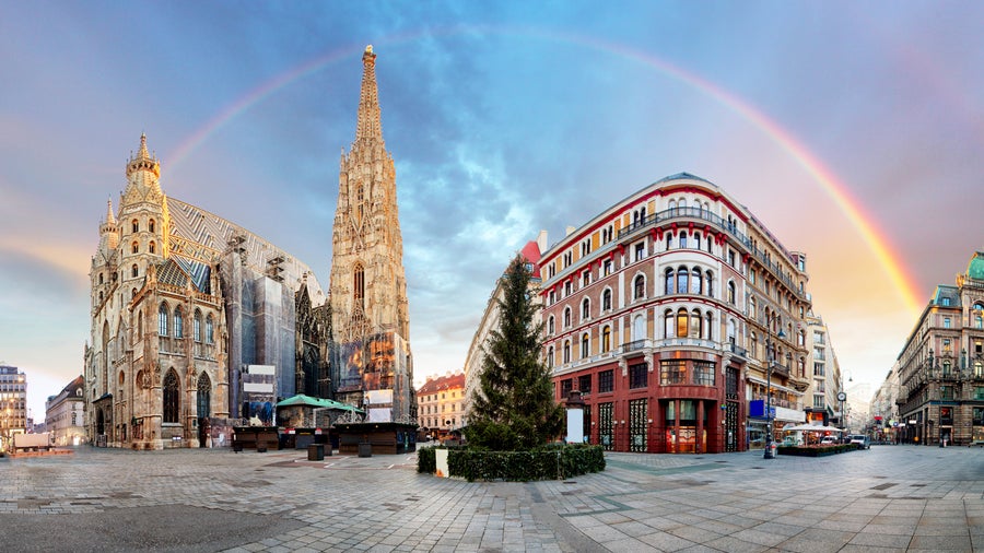 Panorama of Vienna square with rainbow - Stephens cathedral, Austria