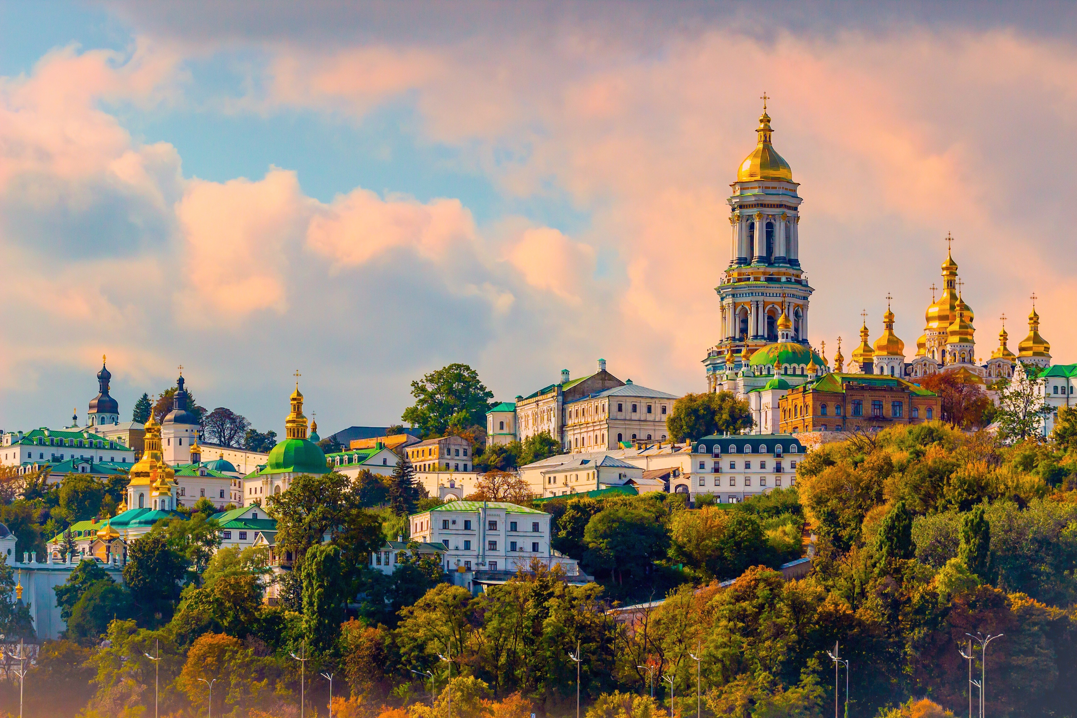 Aerial view of Kiev, Ukraine, featuring Saint Sophia’s Cathedral, other historic buildings, and bustling city life