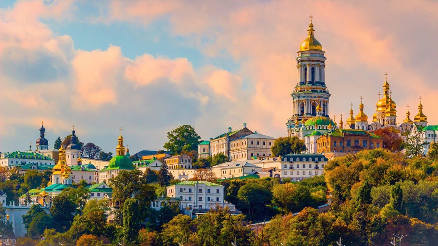 Aerial view of Kiev, Ukraine, featuring Saint Sophia’s Cathedral, other historic buildings, and bustling city life