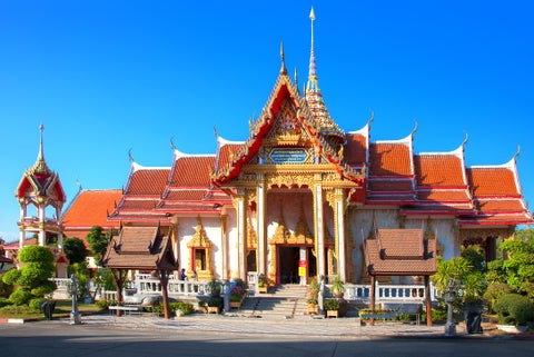 Wat Chalong temple in Phuket, Thailand, featuring ornate architecture and vibrant decorations
