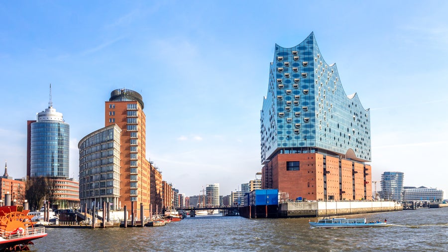 Hamburg City Center with its dynamic cityscape with historic brick warehouses of the Speicherstadt district in Germany
