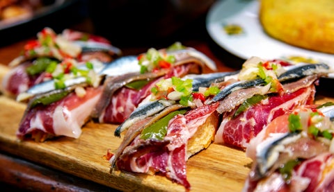 Traditional Spanish dish featuring jamón (cured ham) served in Madrid, Spain