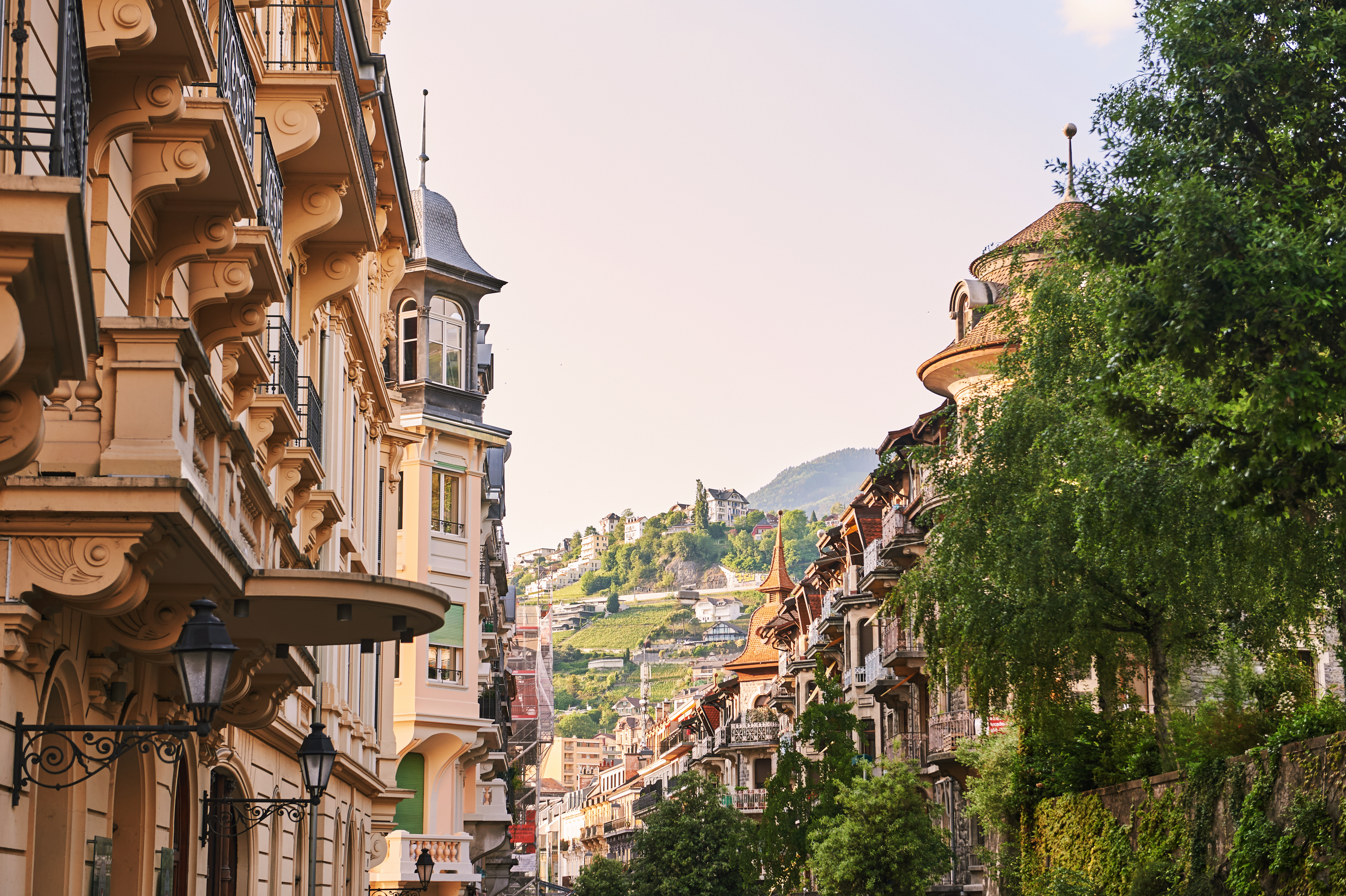 Charming small street in Montreux city, canton of Vaud, Switzerland, with traditional buildings and quaint atmosphere