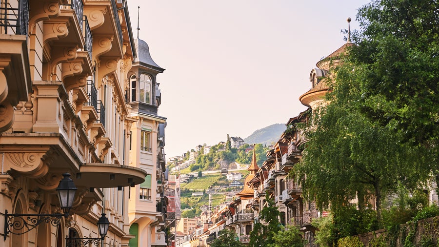 Charming small street in Montreux city, canton of Vaud, Switzerland, with traditional buildings and quaint atmosphere