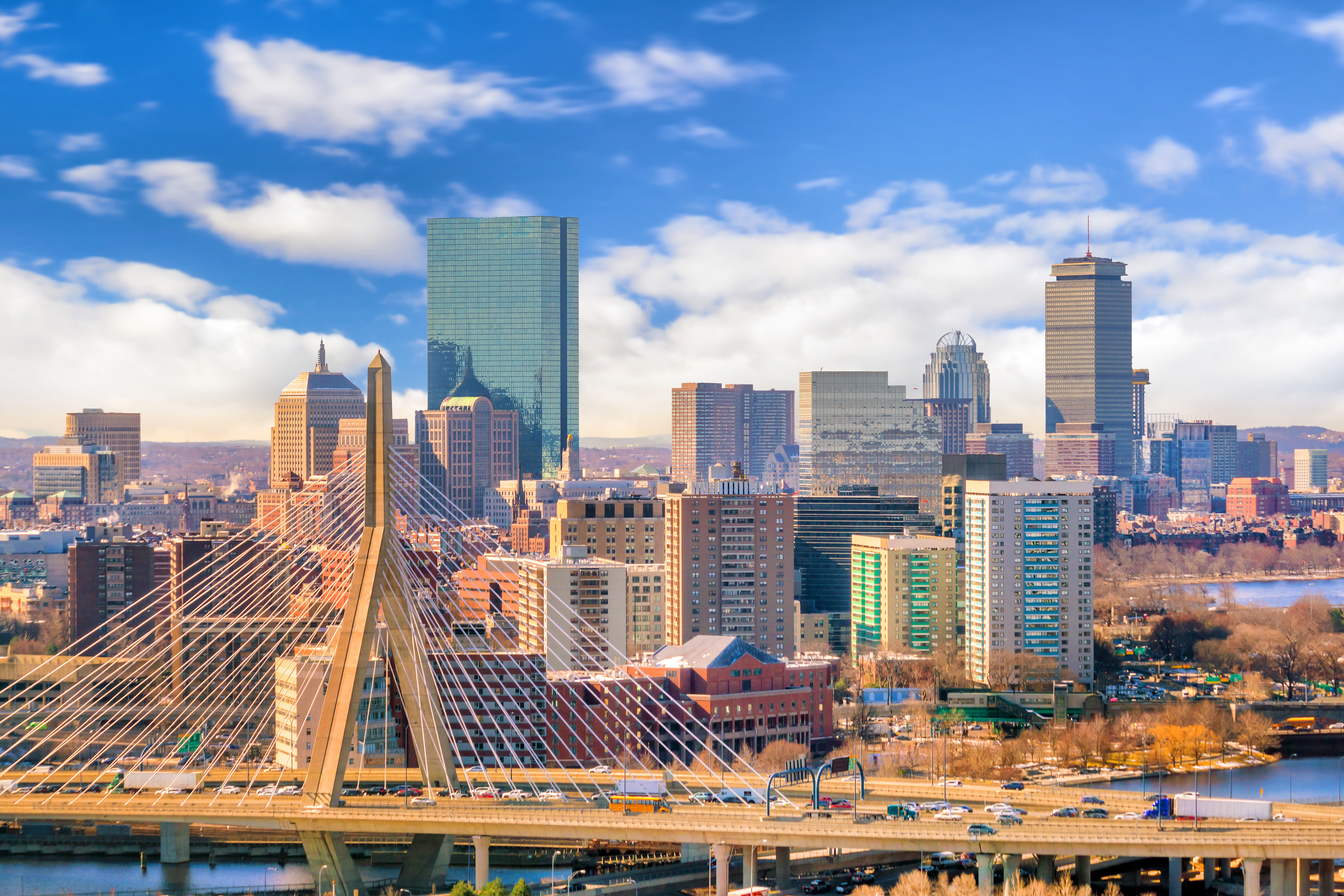 Boston skyline in winter with modern buildings and the Leonard P. Zakim Bunker Hill Memorial Bridge