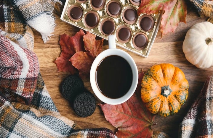 table with coffee chocolate blanket leaves oreos by Unsplash?width=719&height=464&fit=crop&auto=webp