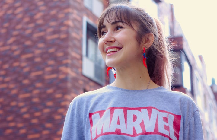 woman wearing a Marvel shirt