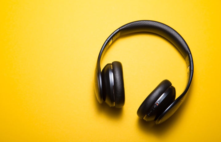 yellow background with headphones