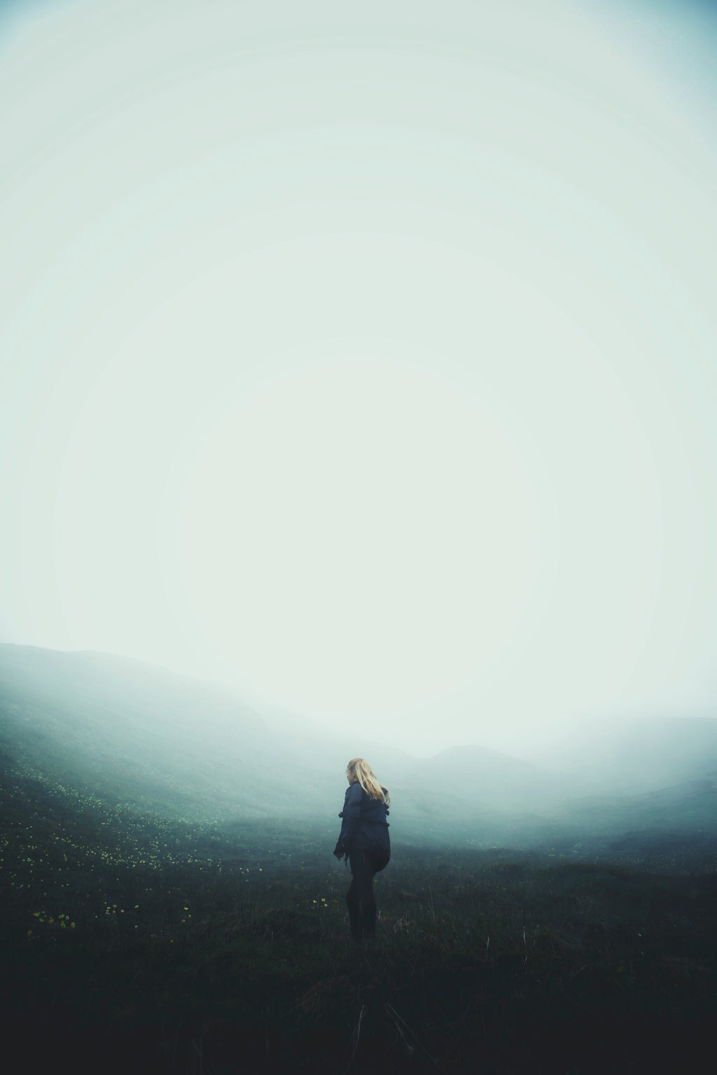 Women in a foggy landscape