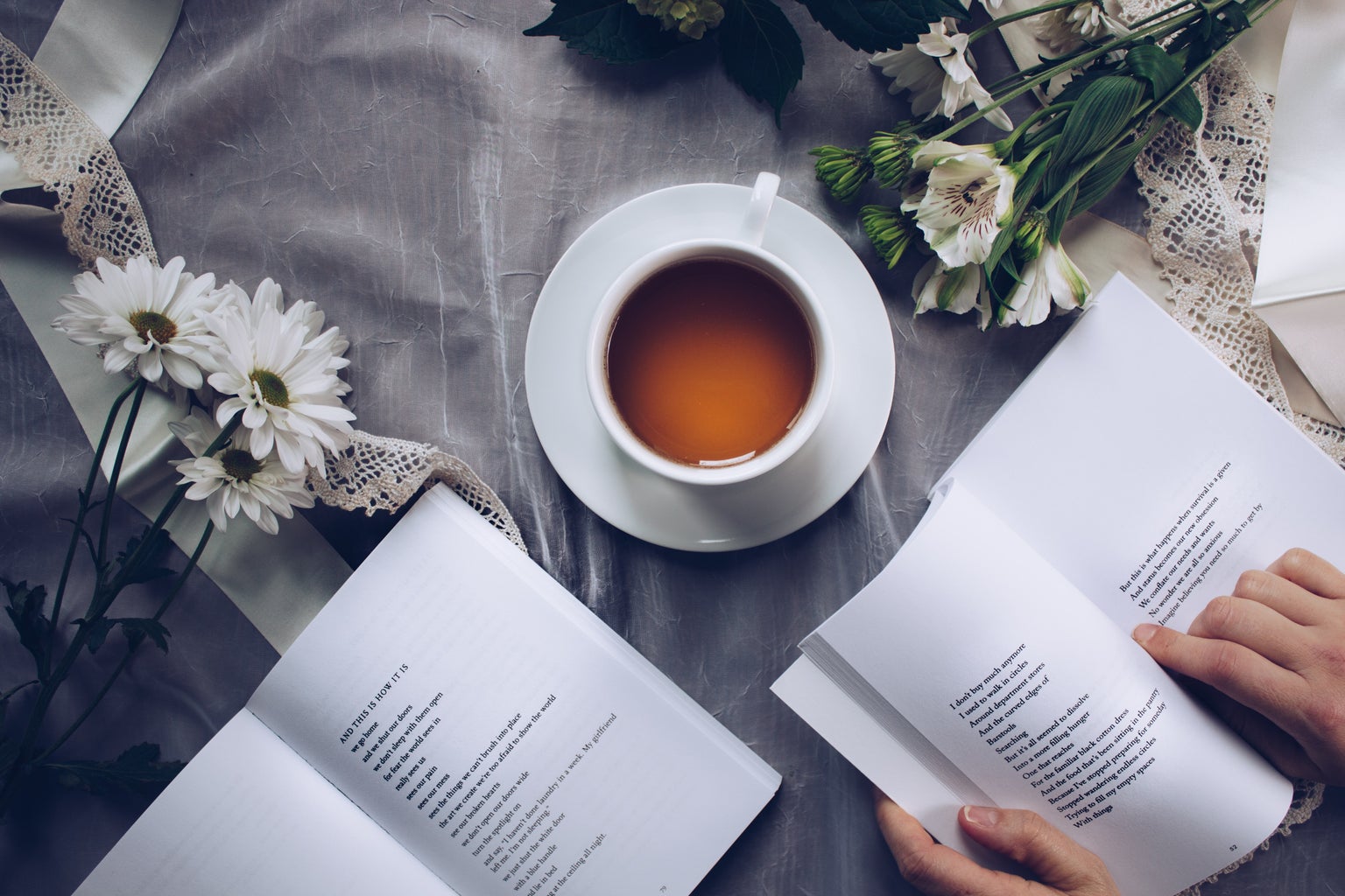 A cup of tea and poetry books