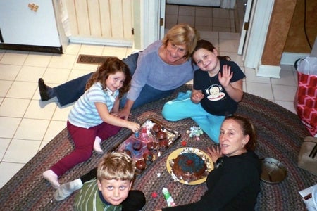 Me and my siblings with my grandmother