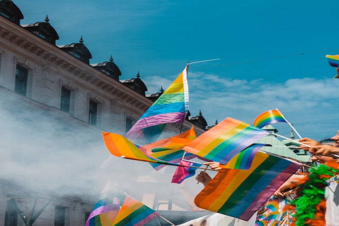 Gay pride flags waving in the air by Teddy sterblom?width=698&height=466&fit=crop&auto=webp