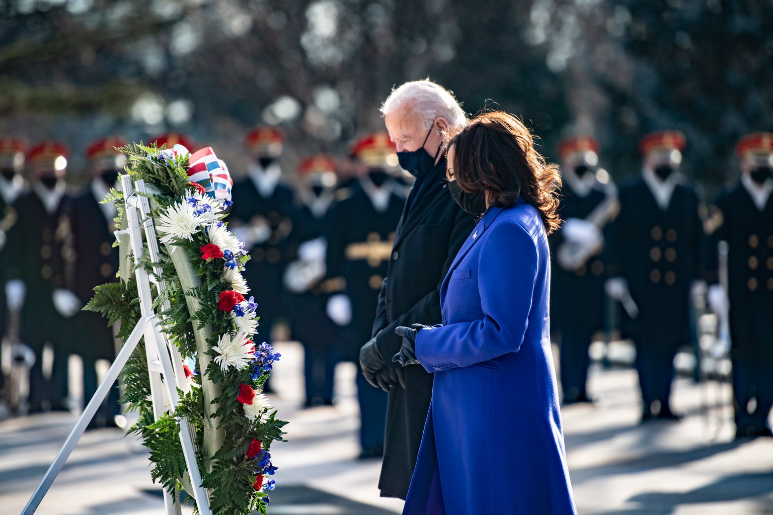 Joe Biden and Kamala Harris lay a wreath at the Tomb of the Unknown Soldier at Arlington National Cemetery
