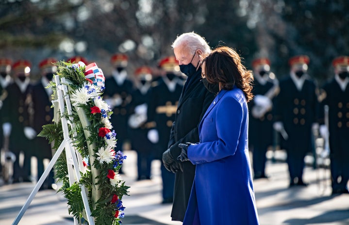Joe Biden and Kamala Harris lay a wreath at the Tomb of the Unknown Soldier at Arlington National Cemetery