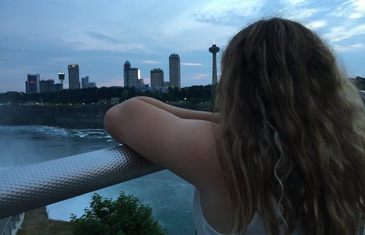 girl looking at the Niagara Falls