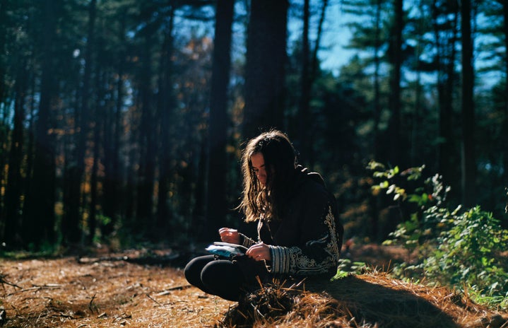 woman sitting in the forest writing by Doug Robichaud on Unsplash?width=719&height=464&fit=crop&auto=webp