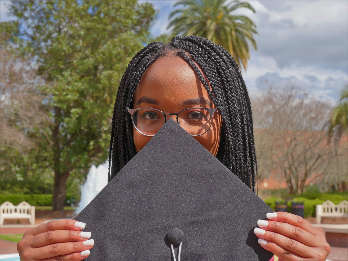 lavonne holding grad cap