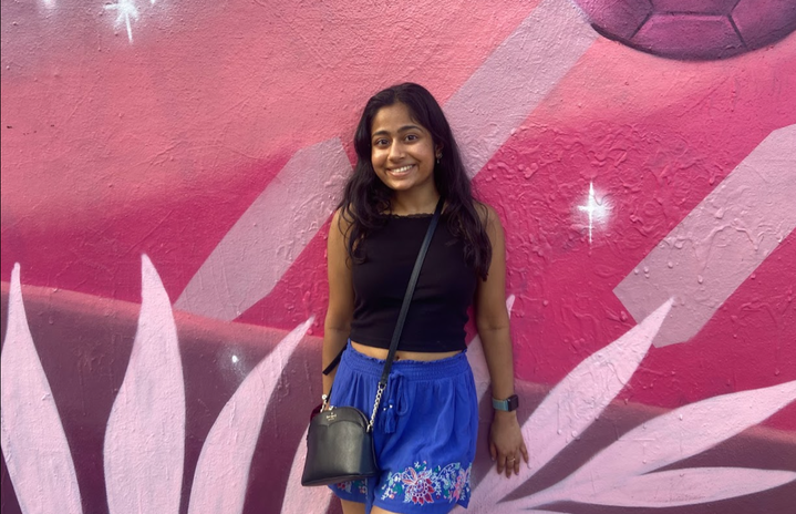 Picture of Sravani against pink wall