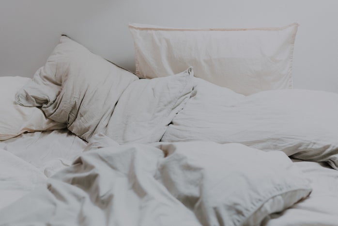 white pillows and white bedding