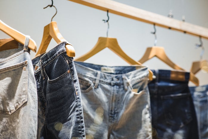 Clothing rack displaying jeans