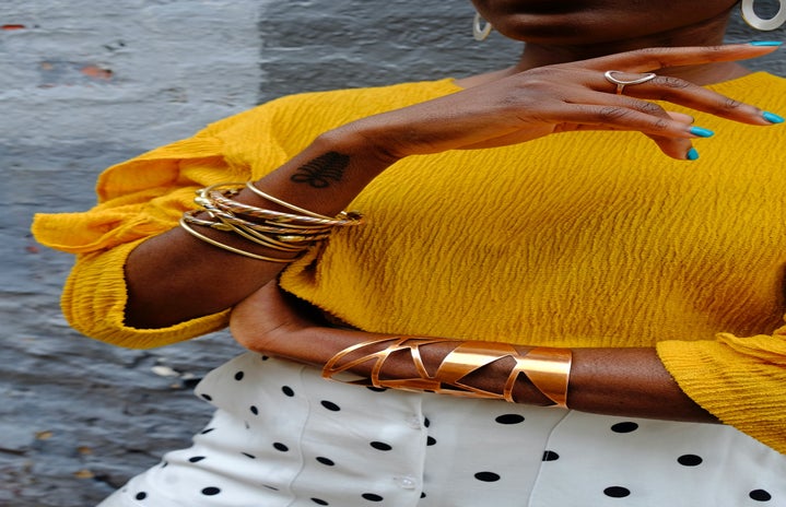 woman with gold bracelets by Mike Von?width=719&height=464&fit=crop&auto=webp