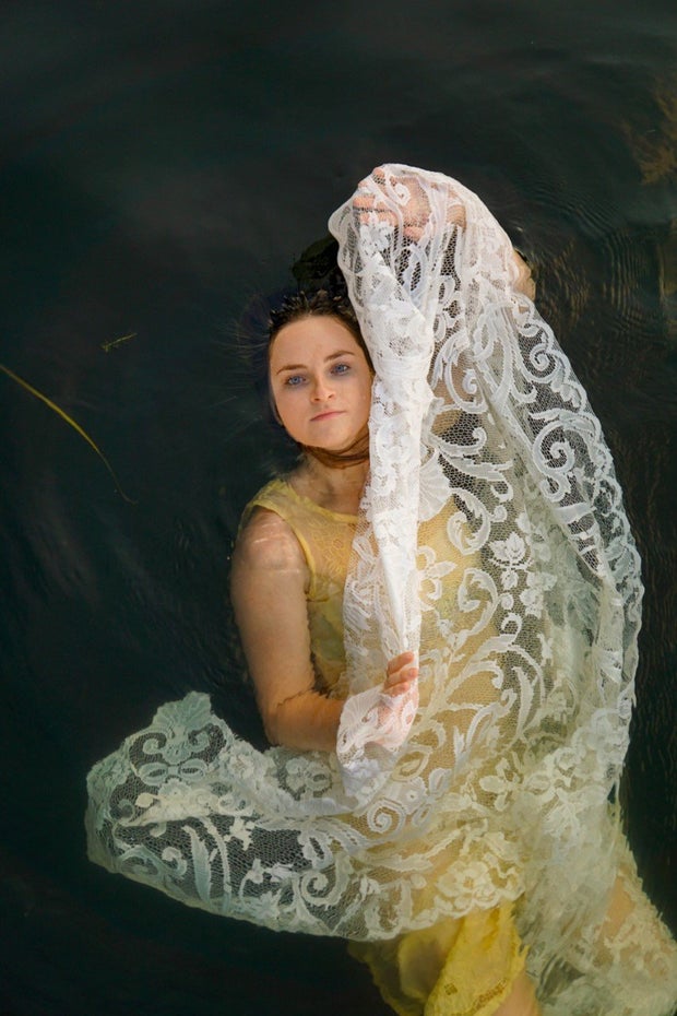 girl in water with lace