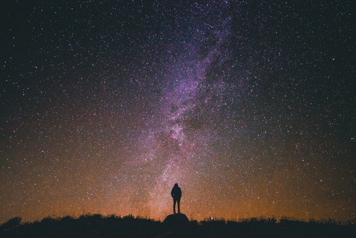 person looking at Night Sky by Greg Rakozy from Unsplash?width=698&height=466&fit=crop&auto=webp