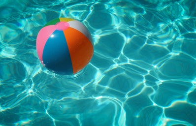 beach ball floating in pool