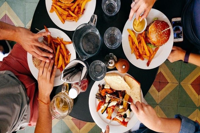 Friends Eating Fries and burgers by Dan Gold?width=698&height=466&fit=crop&auto=webp