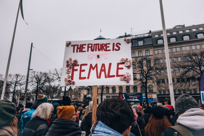 The future is female protest sign by Unsplash?width=698&height=466&fit=crop&auto=webp