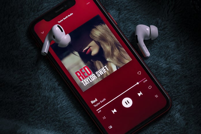 Photo of a phone playing \"Red\" by Taylor Swift