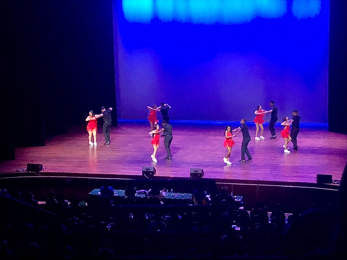 dancers in red