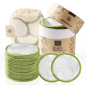 white and green reusable cotton pads
