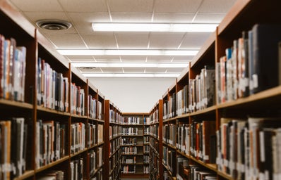 books on shelves in library