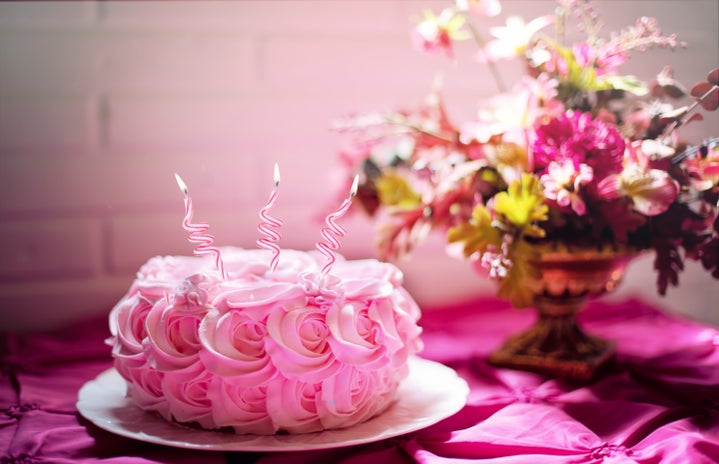 pink birthday cake and flowers?width=719&height=464&fit=crop&auto=webp