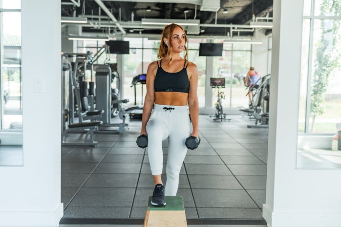 woman exercising at gym