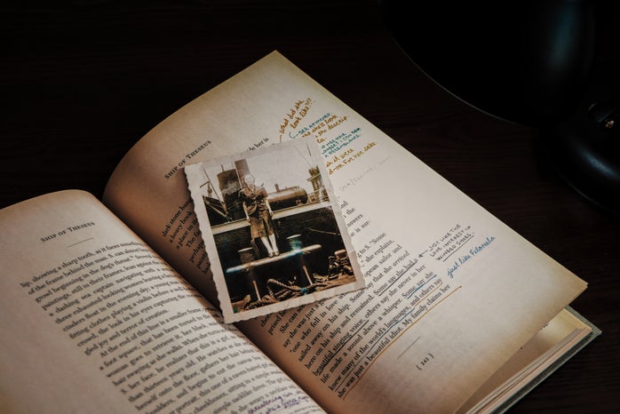 old photo on top of opened book by Jason Wong on Unsplash?width=698&height=466&fit=crop&auto=webp
