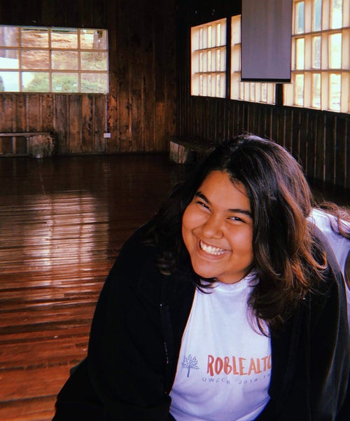 Woman smiling.