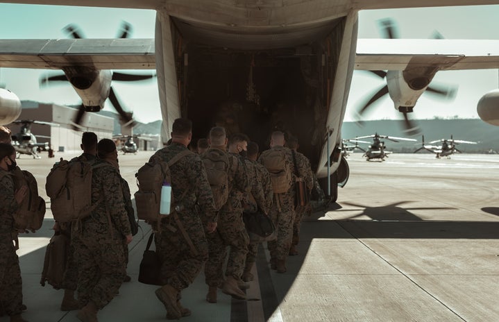 U.S. Marines boarding a plane for deployment.