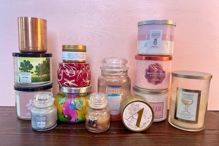 several stacks of candles on a desk