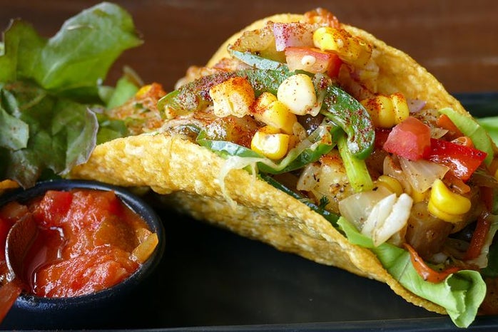 Taco with corn and salsa